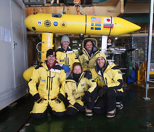 The AUV team from L-R: Peter Kimball (WHOI), Polly Alexander (Australian Maritime College, CSIRO), Rowan Frost (Australian Maritime College). Back (L-R): Clay Kunz (WHOI), Guy Williams (ACE CRC) (Photo: Wendy Pyper)