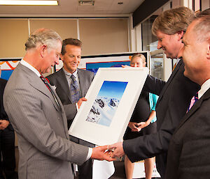 Prince of Wales receiving photograph from Dr Fleming