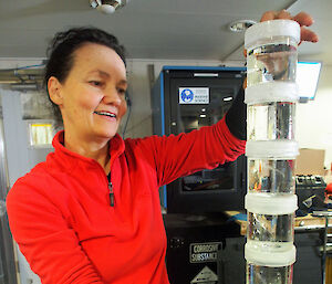 Dr Patti Virtue from the Institute of Marine and Antarctic Studies in Hobart checks krill involved in a growth rate experiment.