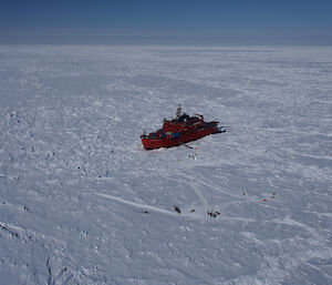 The scientists carrying out their research on the sea ice next to Australia’s icebreaker Aurora Australis.