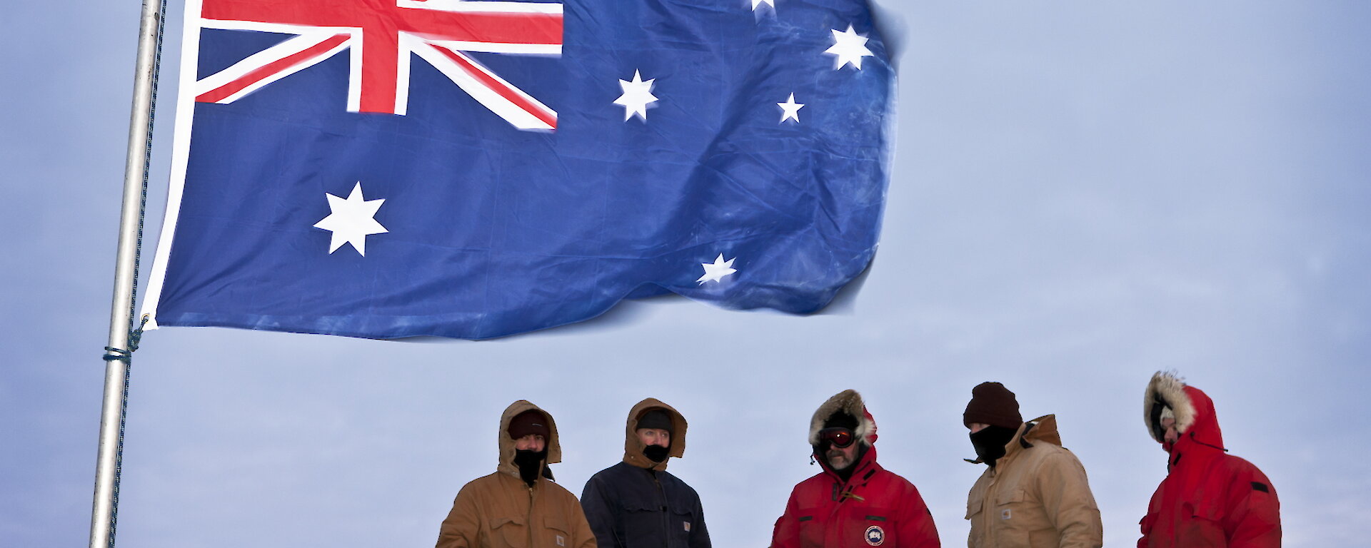 Mawson station expeditioners in winter twilight (Photo: Chris Wilson)