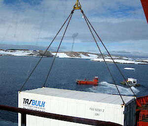 A refridgerated container destined for Casey station is unloaded from the Aurora Australis.