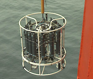 The Conductivity Temperature and Depth (CTD) sensor being lowered off the side of Australia’s Research Vessel Aurora Australis