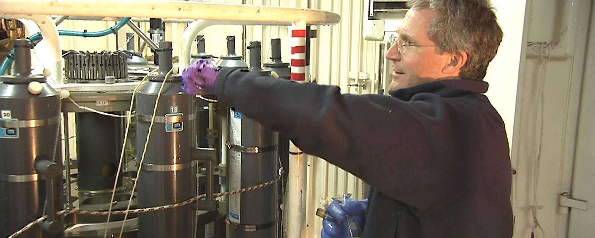 Oceanographer, Dr Steve Rintoul, working on the Conductivity Temperature and Depth (CTD) sensor on Australia’s Research Vessel Aurora Australis