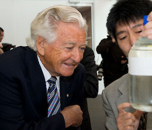 Bob Hawke looking at some live krill at the event in Sydney