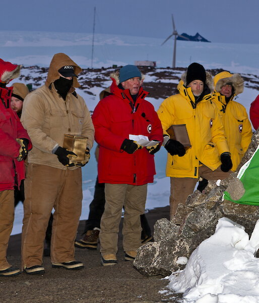 The Mawson station winterers at the interment ceremony for Phil and Nel Law on West Arm.