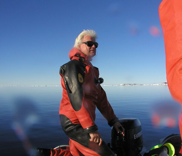 Dr Martin Riddle in small boat off the Antarctic coast