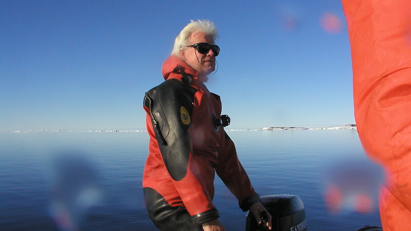 Dr Martin Riddle in small boat off the Antarctic coast