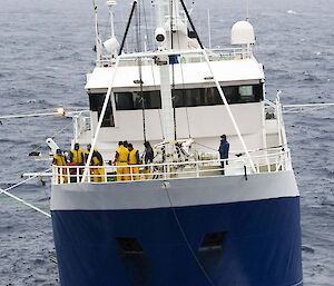 Tow rope being attached to the F.V. Janas