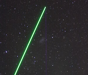 The German Lidar (magenta beam) and the AAD Lidar (green beam) at Davis station (Photo: David Hosken)