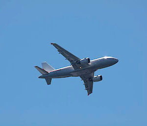 The Australian Antarctic program’s Airbus A319 flies over the flotilla