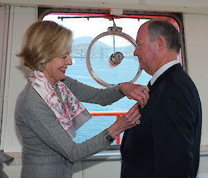 Governor-General pinning medal on Captain Doyle