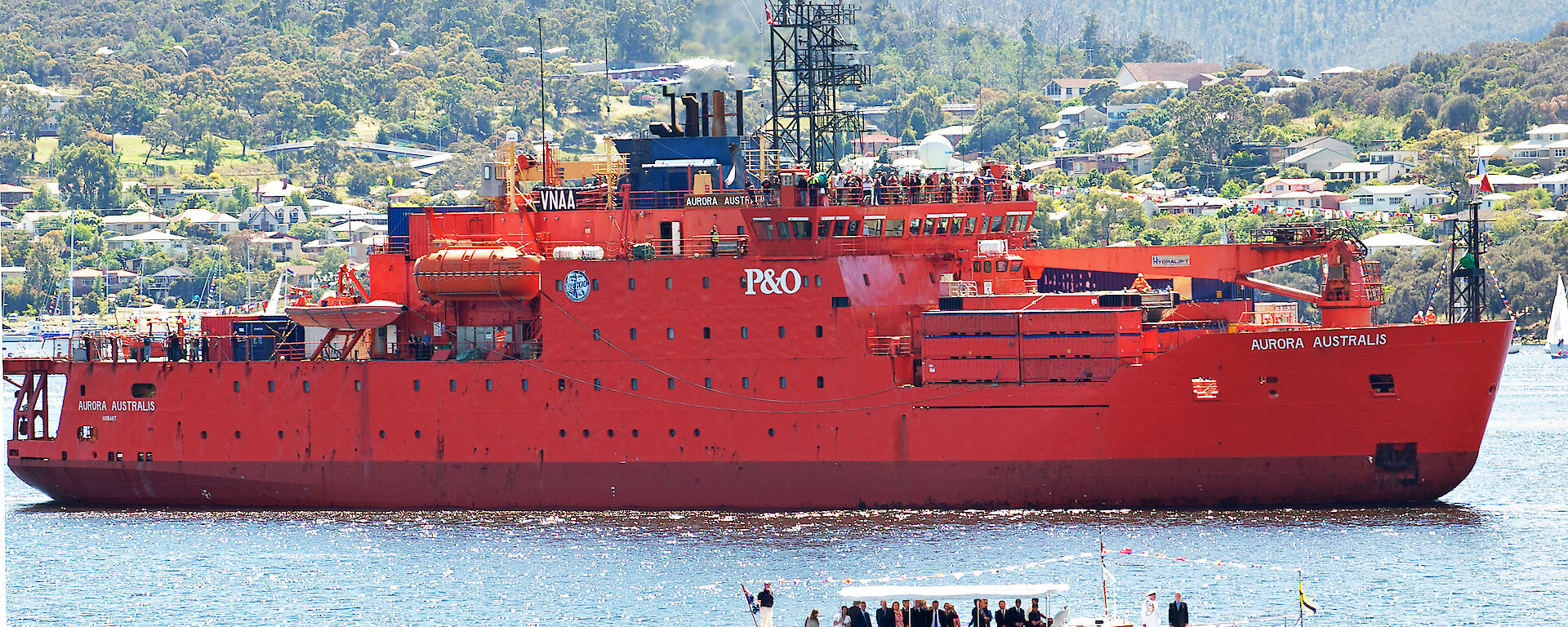 The Aurora Australis leads the Centenary Flotilla down the Derwent River