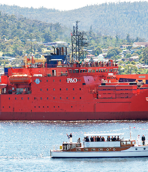The Aurora Australis leads the Centenary Flotilla down the Derwent River