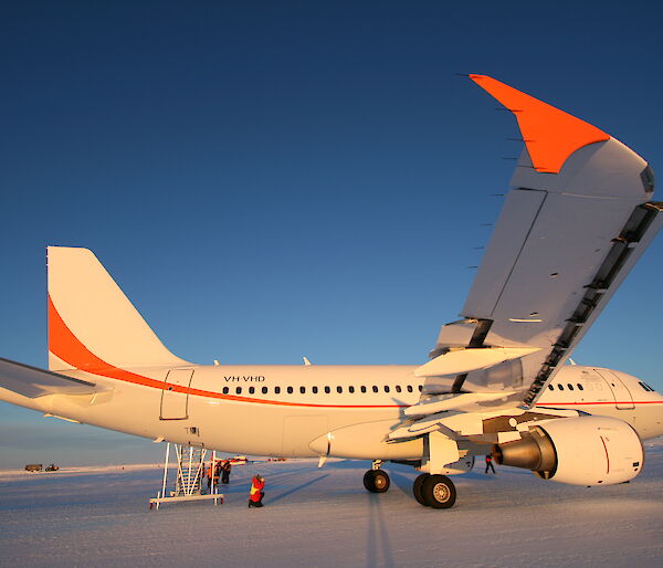 Airbus A319 parked on ice runway