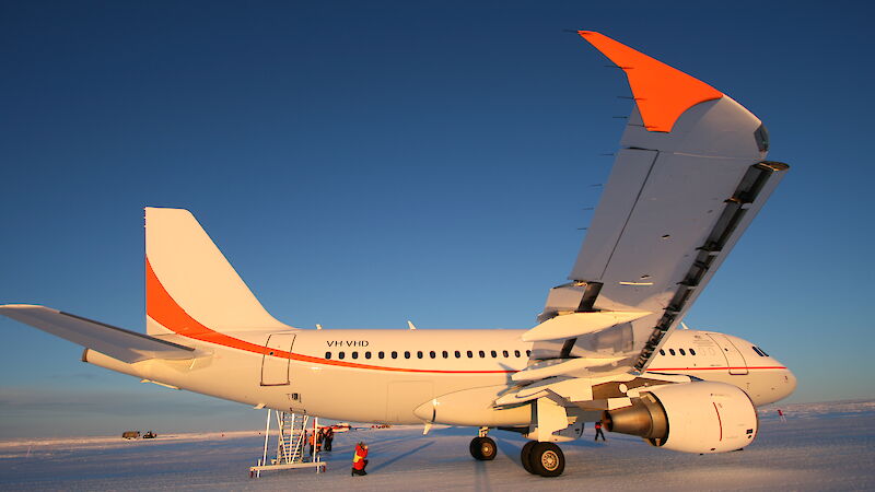 Airbus A319 parked on ice runway