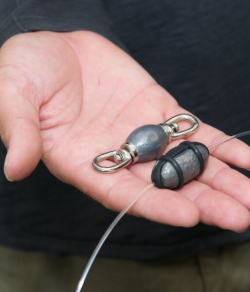 The Safe Lead (right) slides on to the line, while the weighted swivel (left) is tied into the line
