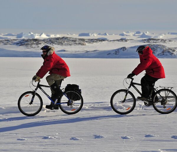 Casey station expeditioners Tim Bolton and Steve Leslie taking part in the Ride to Work Day