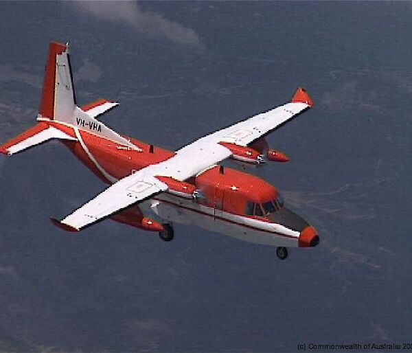 Casa 212–400 in flight