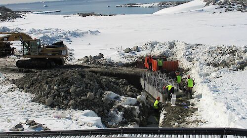 Installing a permeable reactive barrier at Casey station.