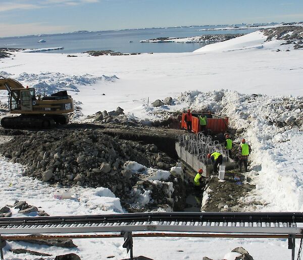 Installing a permeable reactive barrier at Casey station.