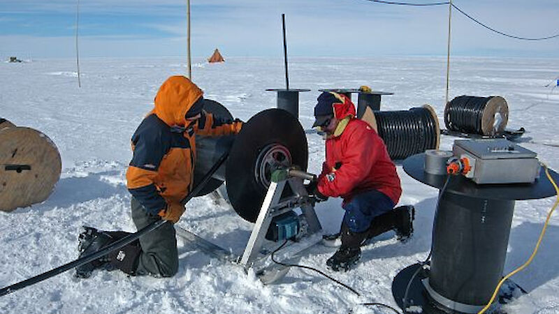 AMISOR hot water drilling program on Amery Ice Shelf — Scientists preparing hose winder for hot water drill