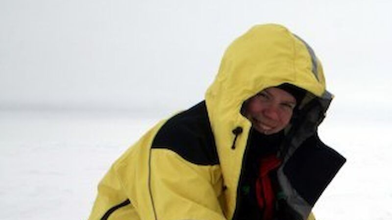 Jane Dobson testing the conductivity of sea ice in Antarctica