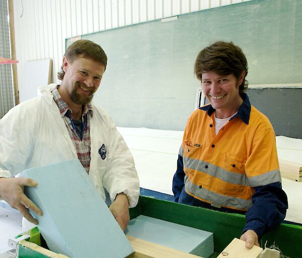 Project Engineer Mark Pekin and Fibreglass Technician Kim Rafferty inspect the internal composition of the panels