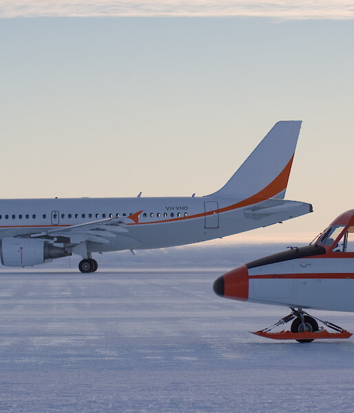 Airbus A319-400 and CASA 212–400 aircraft on the Wilkins Ice Runway in Antarctica