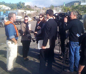 Australian Antarctic Division Shipping Officer, Mick Davidson, is interviewed by journalists