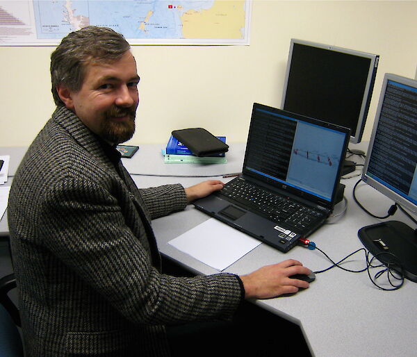 Ian Ball working on his computer on the Marxan software