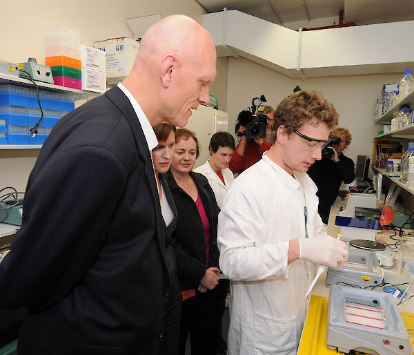 Minister Garrett and others in science lab