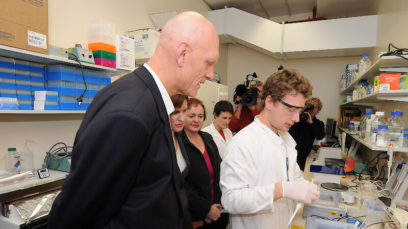 Minister Garrett and others in science lab