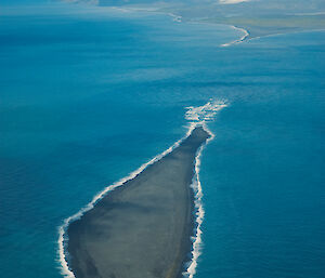 Aerial view of Elephant Spit showing a section of the sand spit at the eastern end of the island has now been inundated by the ocean leaving a small island