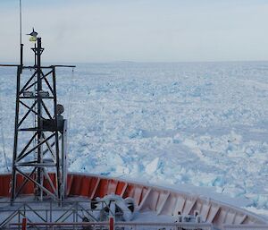 Aurora Australis in heavy pack ice as seen looking over the bow of the ship.