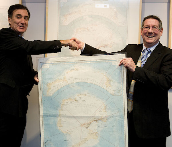 AAD Director Dr Tony Press (right) presents the map to National Archives Director-General Ross Gibbs
