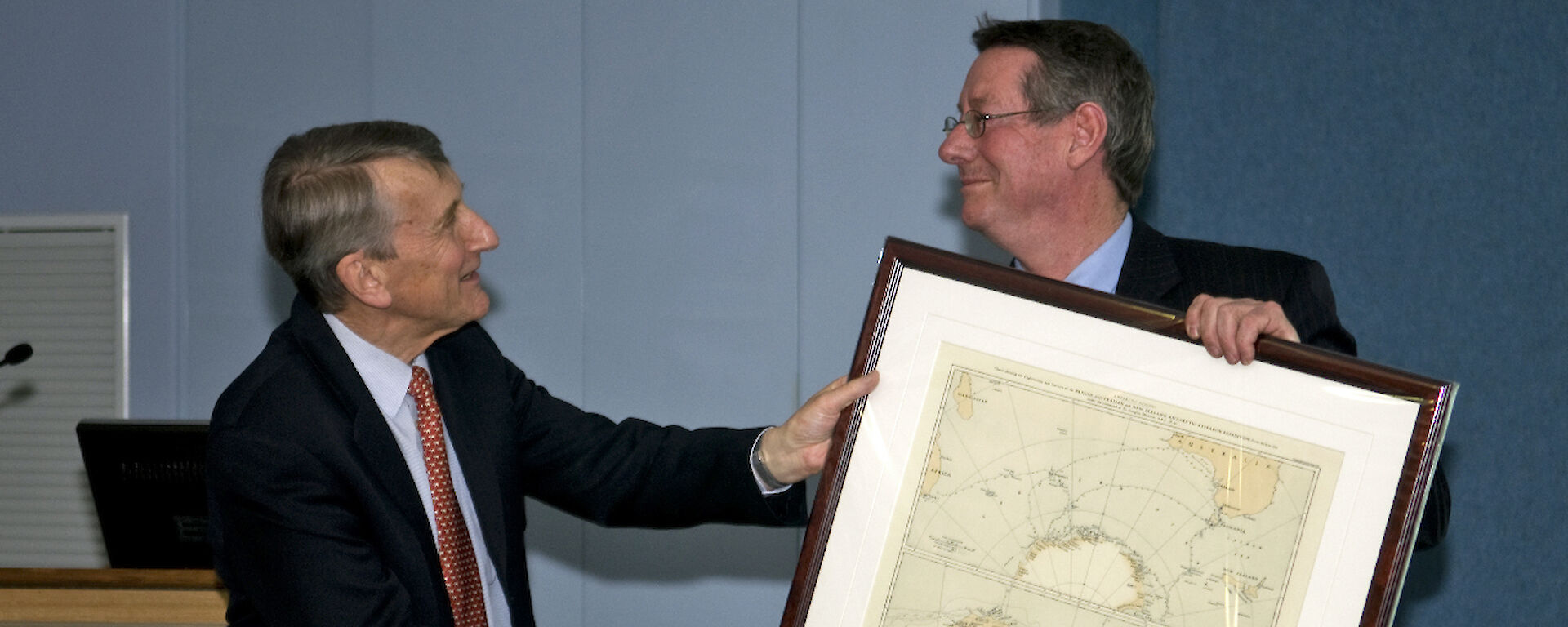 Professor Stoddart’s receives a framed map of Antarctica from Antarctic Division Director, Tony Press.