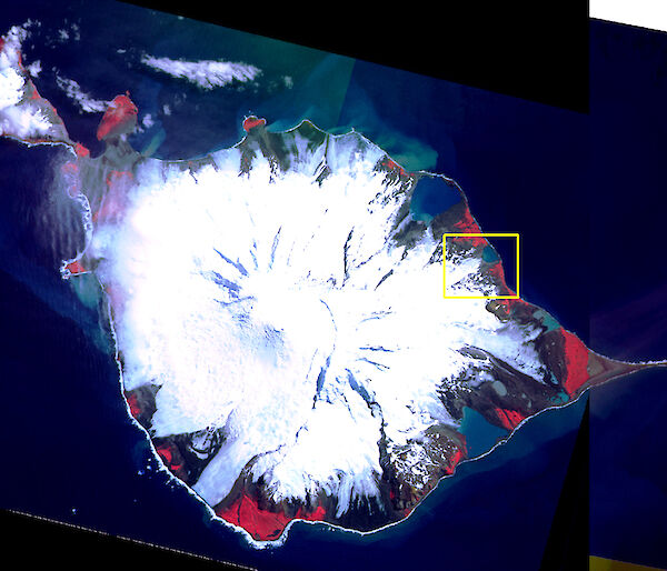 A mosaic of SPOT satellite images from 1988 and 1991 of Heard Island. The yellow box shows the area of interest displayed in the following two images.