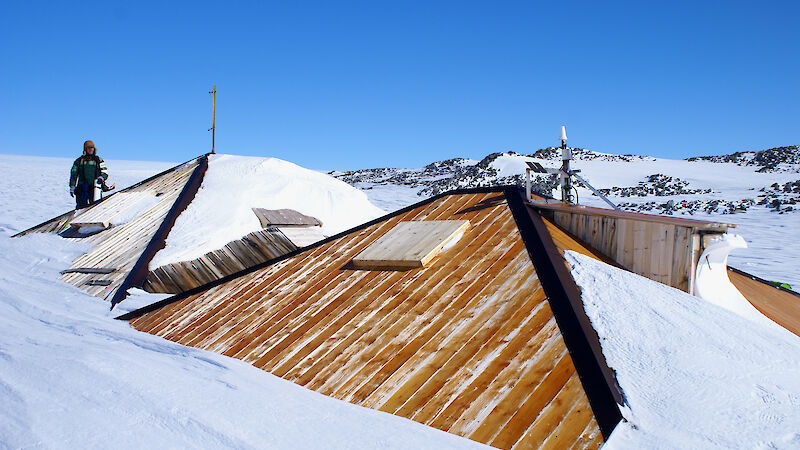 After restoration, overcladding of the main hut roof in progress