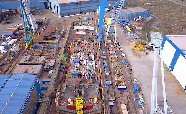 The base of the ship’s hull takes shape in the dry dock at Damen Shipyards in Romania