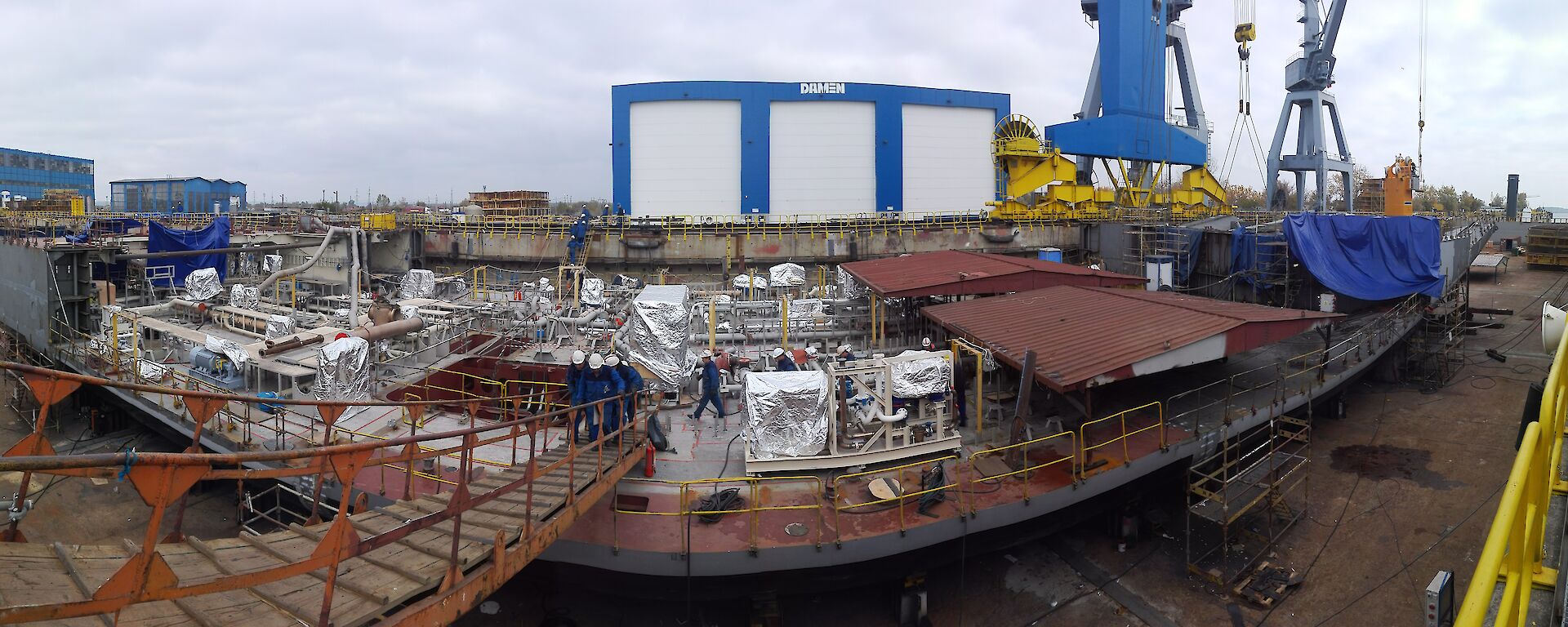 Assembled blocks in the dry dock that form the tank top deck within the two main engine rooms and the supporting deck under the two forward cargo holds.