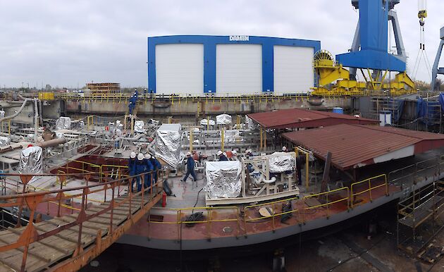 Assembled blocks in the dry dock that form the tank top deck within the two main engine rooms and the supporting deck under the two forward cargo holds.