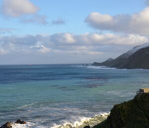 The Aurora Australis in the distance off the coast of Macquarie Island.