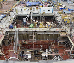 Two dry cargo holds sitting forward of the bridge.
