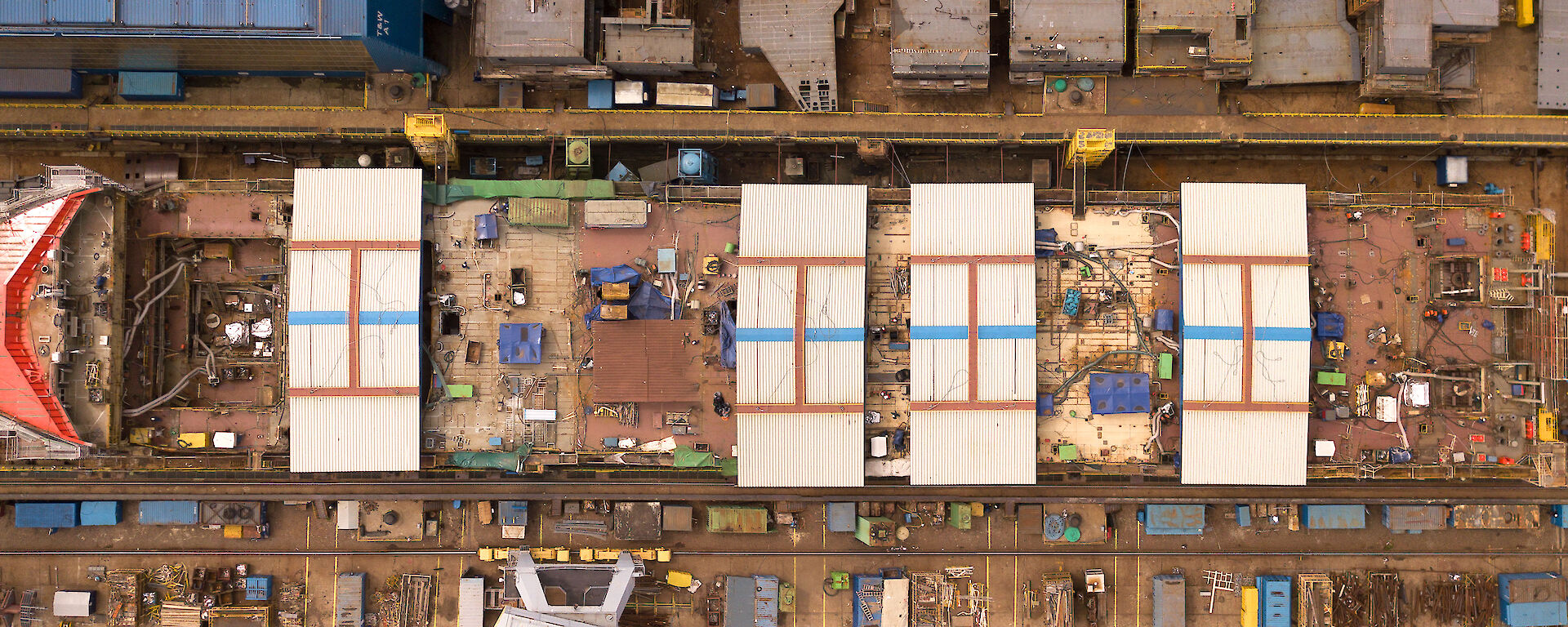 An aerial view of the Nuyina showing roofs over deck 4 for weather protection.