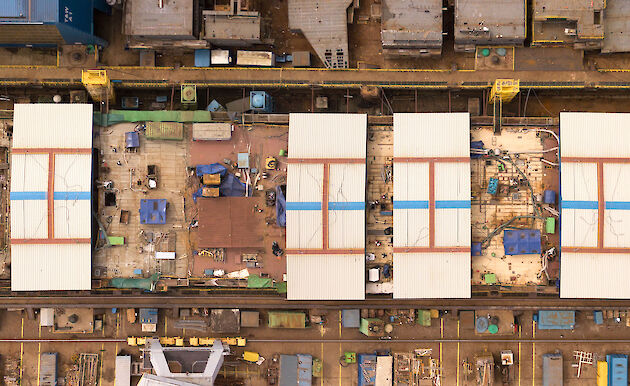 An aerial view of the Nuyina showing roofs over deck 4 for weather protection.