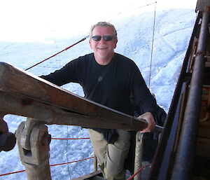 A man climbing the gangway up to the ship