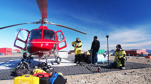 The White Spark Pictures crew prepare to board a helicopter to fly to the Sørsdal Glacier.