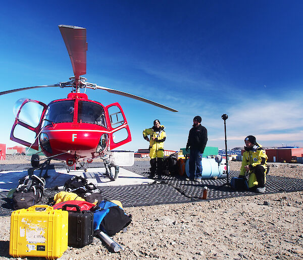The White Spark Pictures crew prepare to board a helicopter to fly to the Sorsdal Glacier.