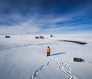 Casey research station expeditioners collect the cargo from the airdrop